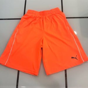 Neon orange puma shorts